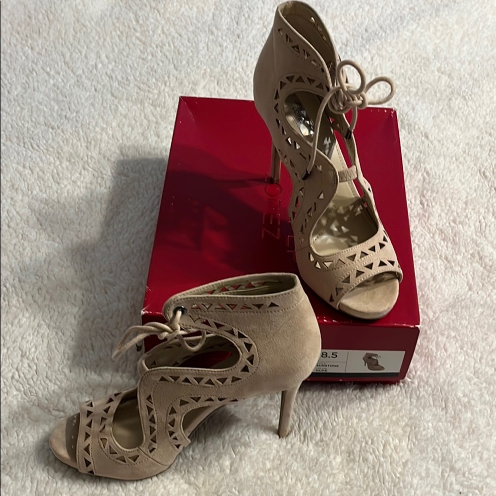Jennifer Lopez Tan Stiletto Heels with Lace-Up Design